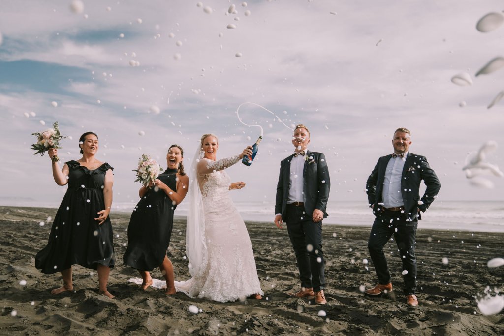 Real Bride Jamielle wearing her Custom Harriett Falvey Wedding Dress and Veil Made in New Zealand